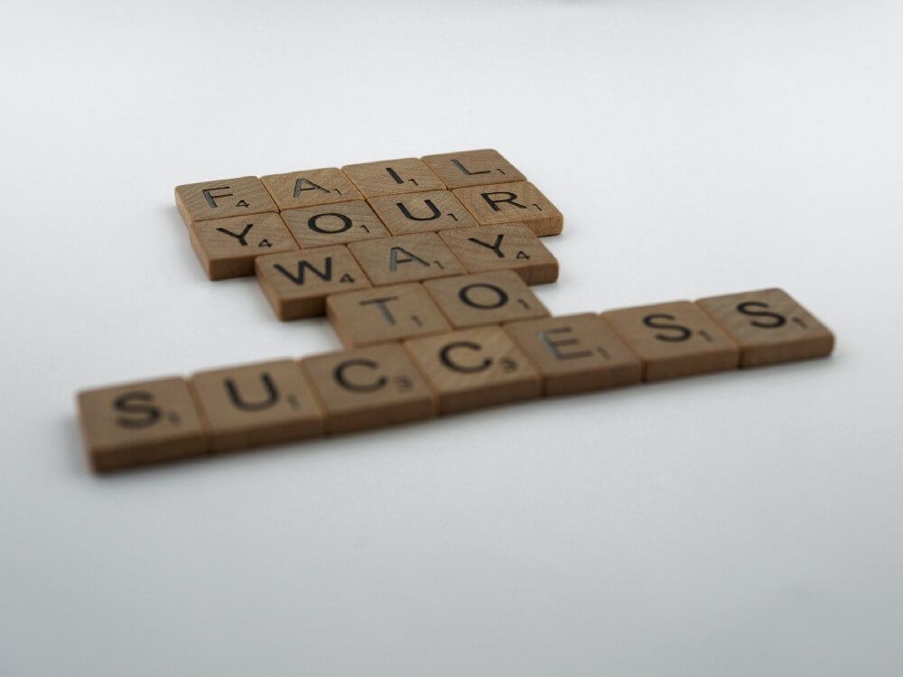 Lettered tiles - spelling "fail your way to success"